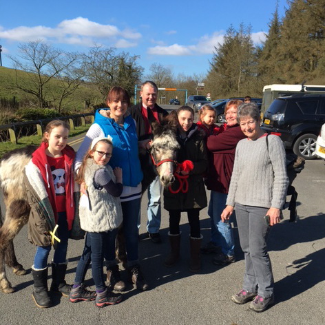 Gathering with donkeys on Palm Sunday